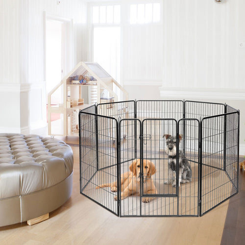 Two dogs inside a black metal pet playpen in a room with a bed and toys.